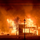 Buildings are engulfed in flames as a wildfire ravages the central Oregon town of Talent near Medford.